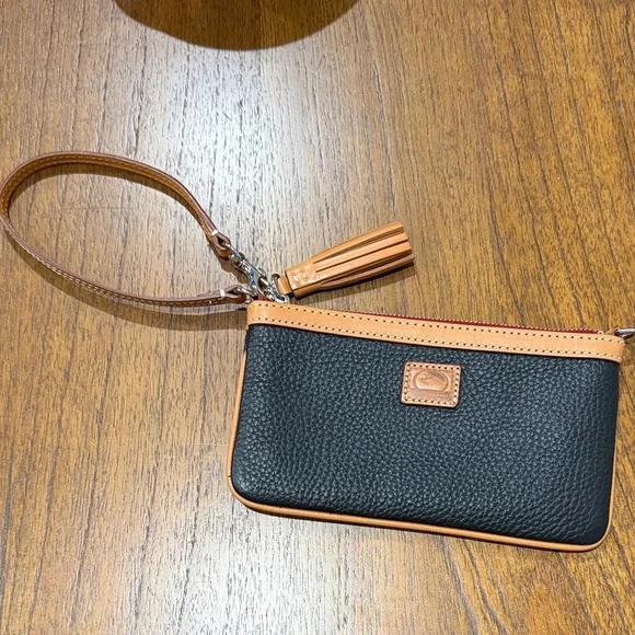 Dooney & Bourke Black and Tan Pebbled Leather Wristlet with Tassel - Picture 5 of 5